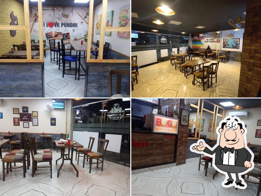 Take a seat at one of the tables at Hungry Point - Pundri
