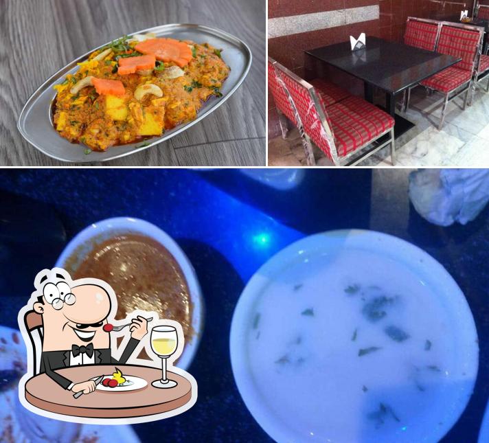 Among different things one can find food and interior at New Balaji Family Dhaba