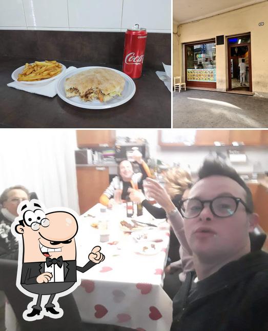 La foto di interni e bevanda da Bangla Pizza Kebab