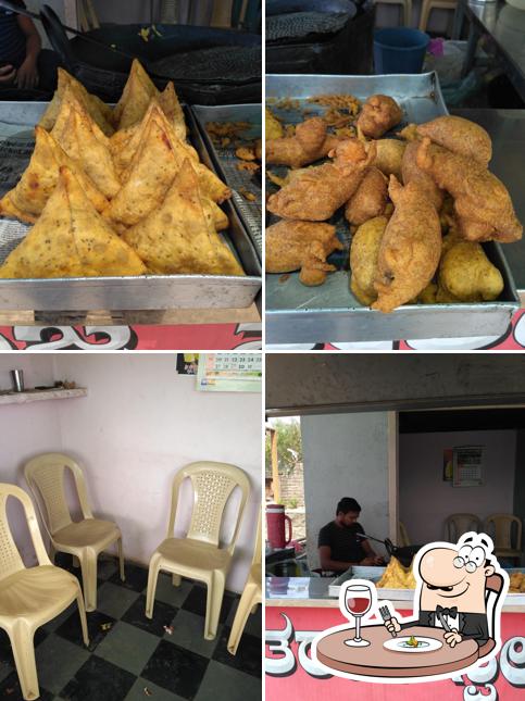 Check out the image displaying food and interior at Sanju Vada Pav And Samosa Center