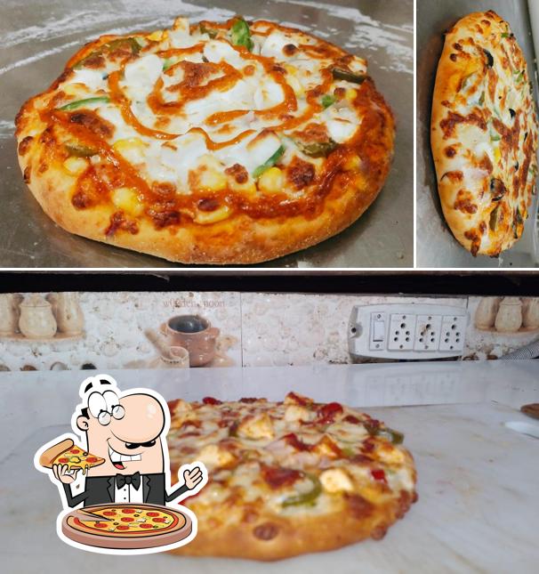 Get pizza at Alvin Pizza Una (CD complex near HDFC bank)