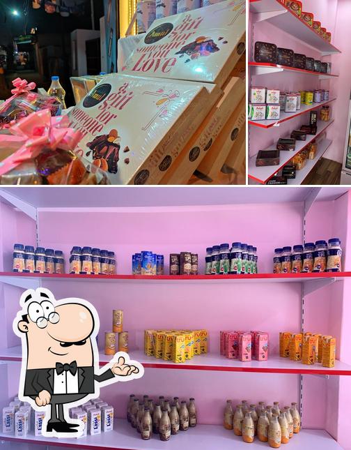 The photo of AMUL A P O (VAIBHAV BAKERY)’s interior and food