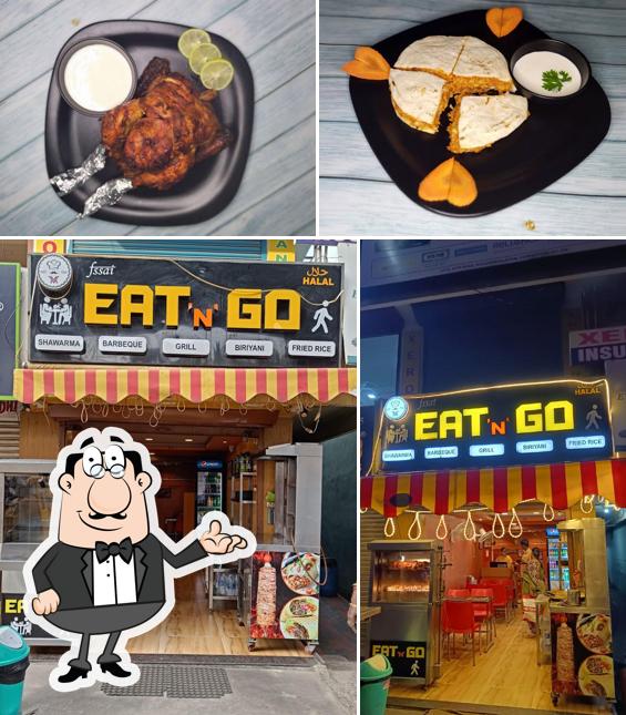 This is the image displaying interior and food at Eat N Go