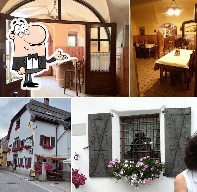 Siediti a un tavolo di Locanda Aquila Nera