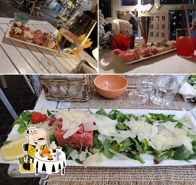 Guarda la foto che presenta la cibo e vino di Cafè Riviera