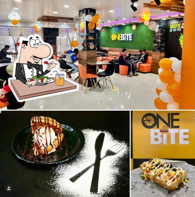This is the photo depicting food and interior at One bite