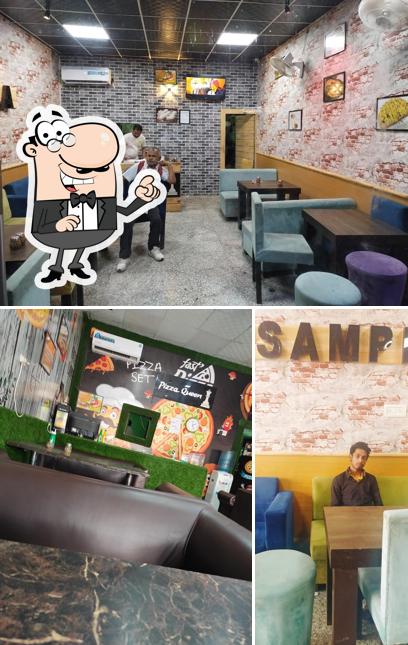 The interior of PIZZA QUEEN SAMPLA haryana 124501