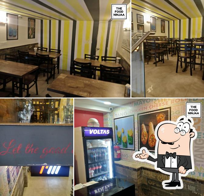Take a seat at one of the tables at Rolls mania