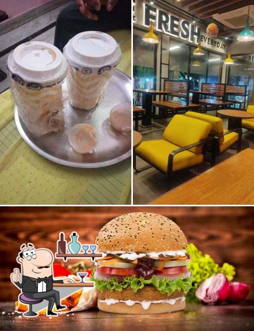 Take a seat at one of the tables at The Burger Club