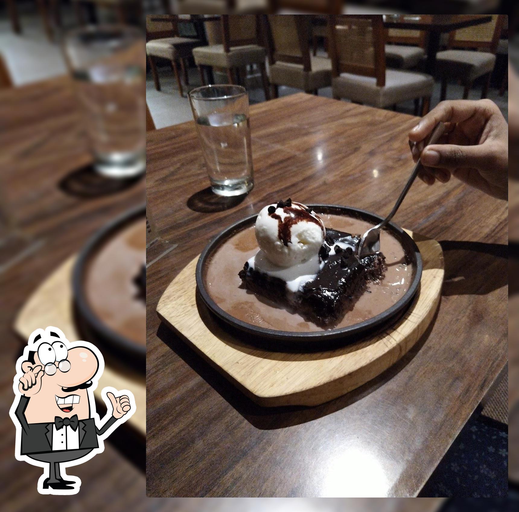 Take a seat at one of the tables at Palaram Bakery