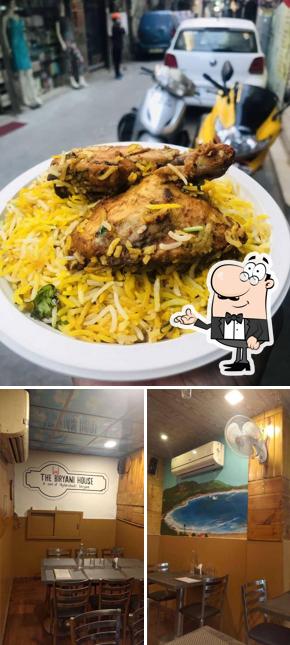Take a seat at one of the tables at The Biryani House