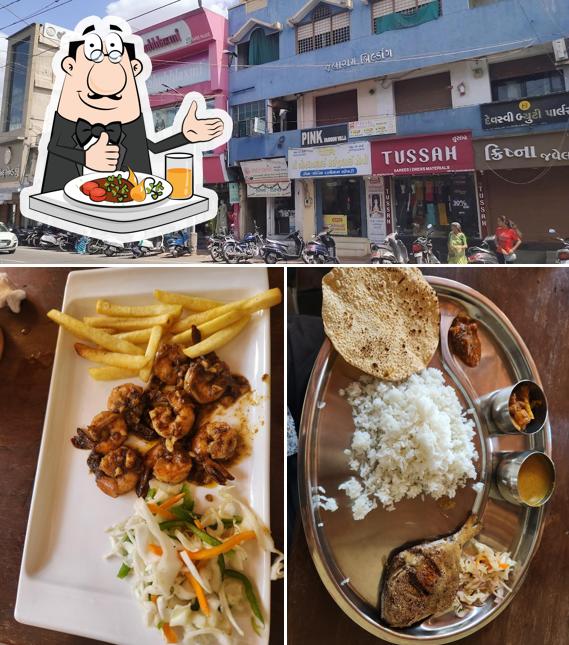 Check out the photo showing food and exterior at Yummy Restaurant