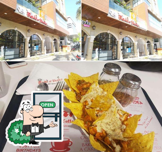 This is the picture displaying exterior and food at Bake-n-Shake
