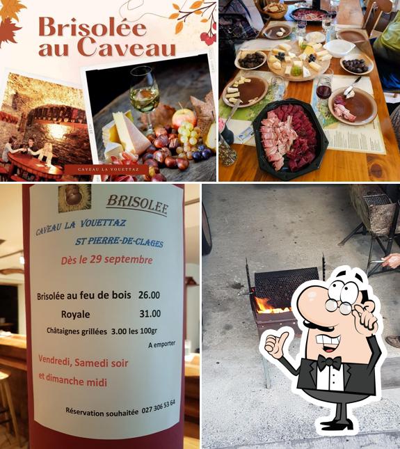 La foto della interni e cibo di Caveau La Vouettaz