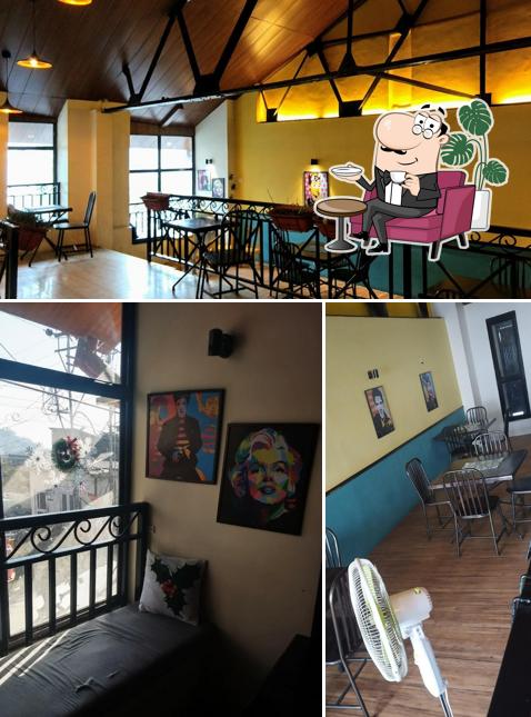 Take a seat at one of the tables at The coffee lodge