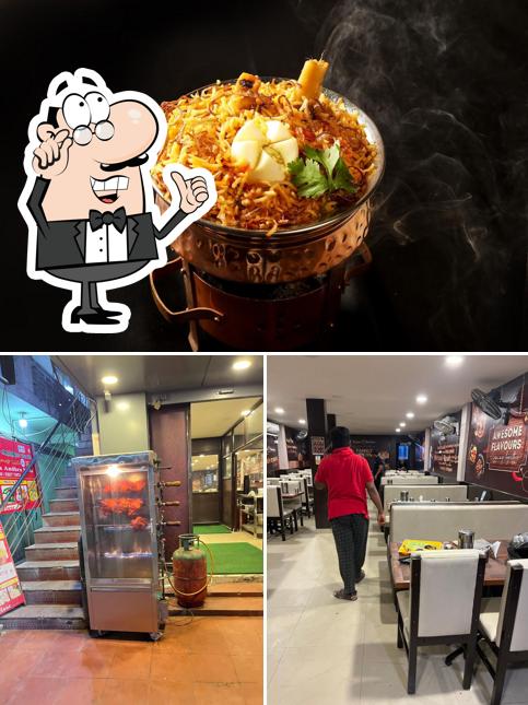 This is the image showing interior and food at Biriyani Brothers