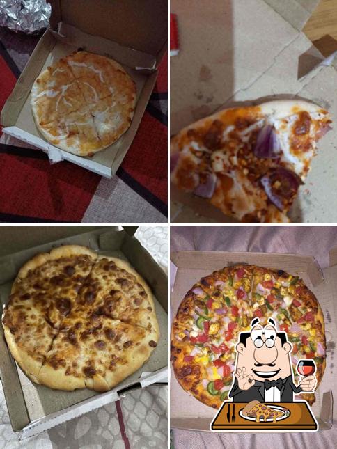 Get pizza at Doubles Pizza Cafe