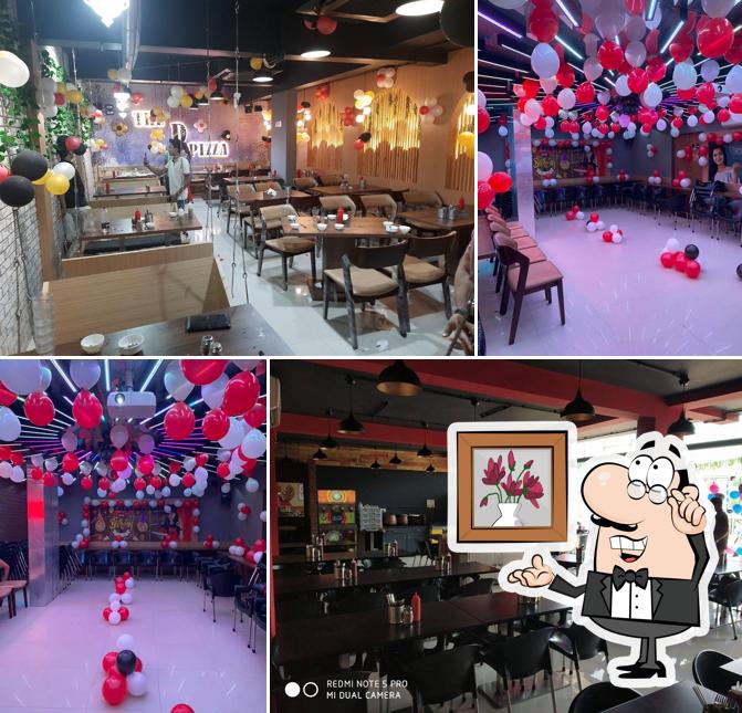 Take a seat at one of the tables at The D Pizza