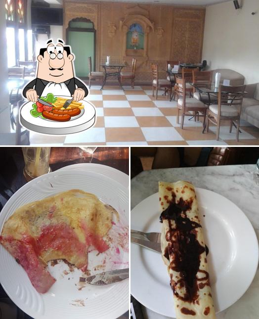 The photo of food and interior at Café Sheesh Mahal