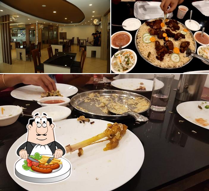 Check out the image depicting food and interior at Nahdi Kuzhimandhi