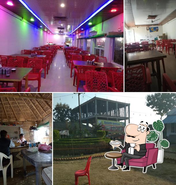 Take a seat at one of the tables at Radharani Bhojanalya