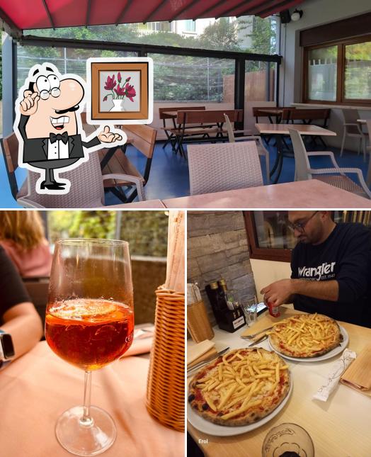 Questa è la immagine che presenta la interni e cibo di Pizzeria Ristorante Bar Ambra