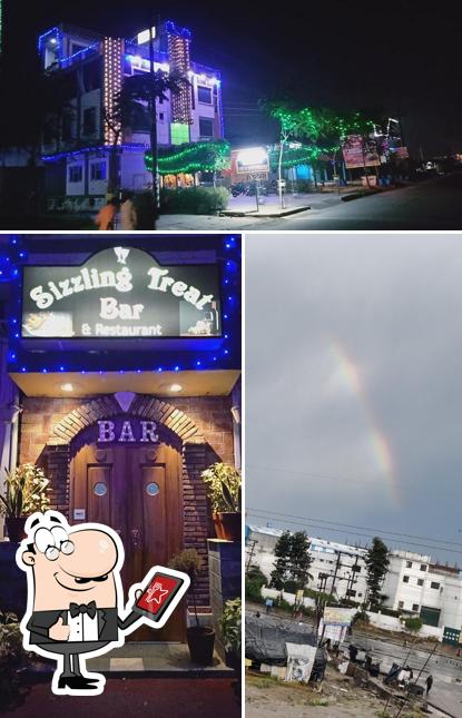 The exterior of Hotel Akshat,Sizzling Treat Bar & Restaurant