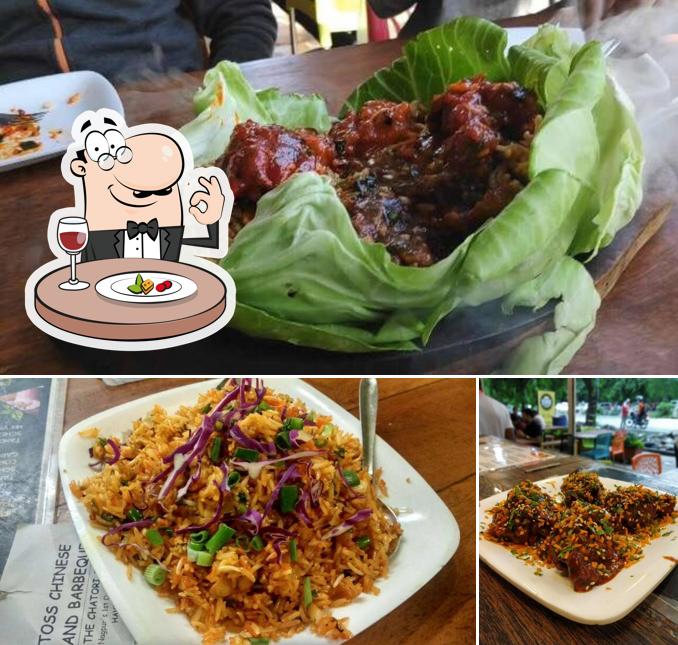 The photo of food and interior at Toss