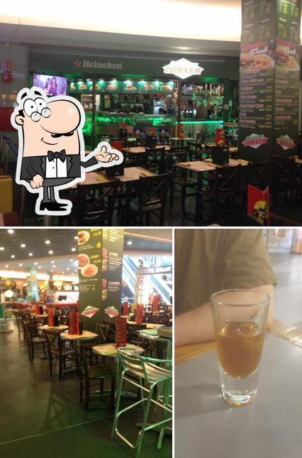 Questa è la foto che presenta la interni e birra di Heineken Beer Corner