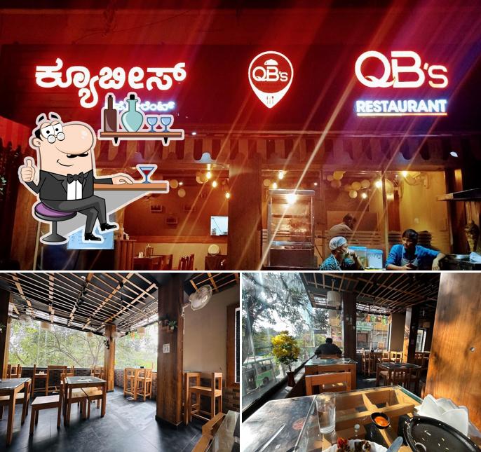 Take a seat at one of the tables at QB's Restaurant