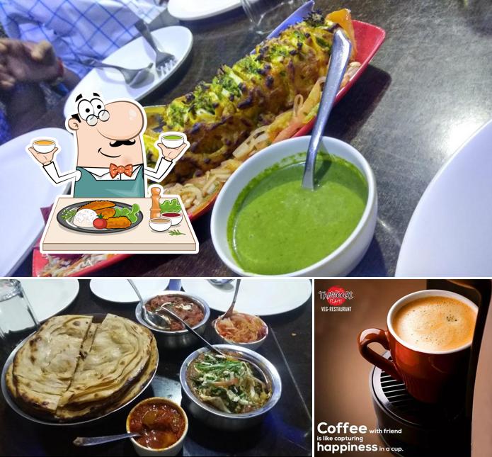 Check out the picture displaying food and beer at Tandoori Flame Restaurant