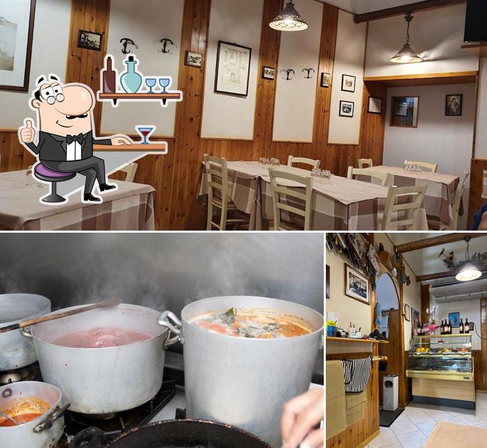 La immagine di interni e cibo da Trattoria L'Arco