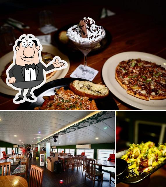 The photo of interior and food at Cafe Relish by Flodine Cruise