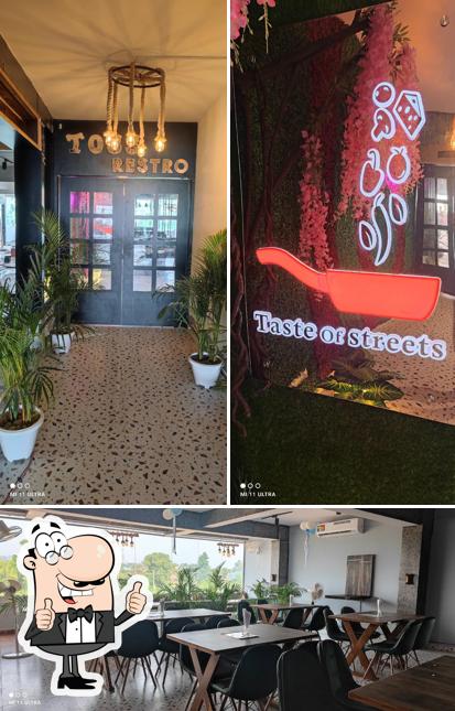 Look at this image of TOSS Restro Food Court Bakery