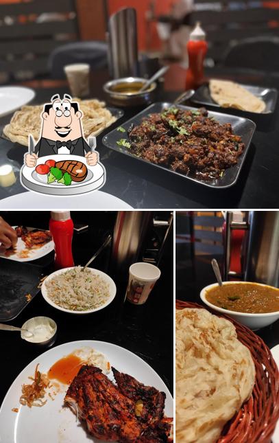 Order meat dishes at Aathas bakes and restaurant