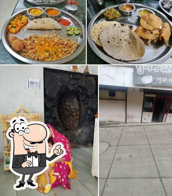 Sugam Pure Veg Dining is distinguished by exterior and food