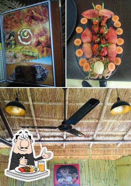 The photo of The Anokhi Hut’s food and interior