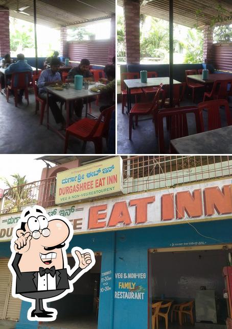 Take a seat at one of the tables at Durgashree Eat Inn