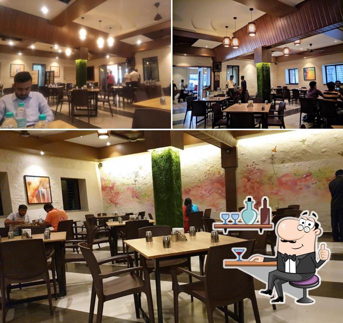 Take a seat at one of the tables at Thali House