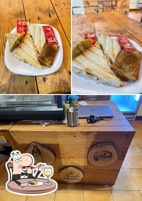 Take a look at the photo displaying food and interior at The Joint Cafe