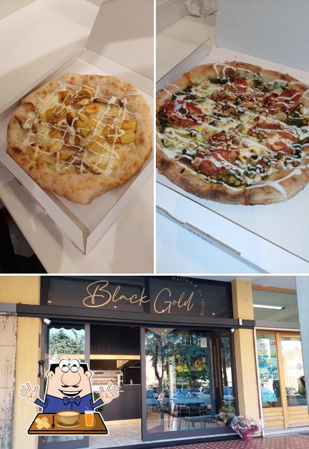 Guarda la foto che mostra la cibo e esterno di Pizzeria Black Gold Da Adelin