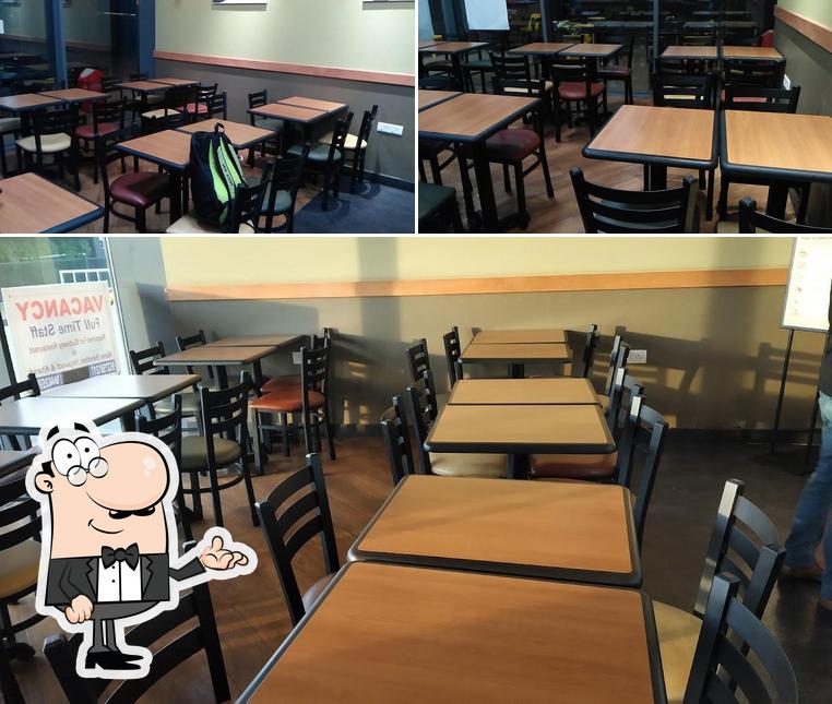 Take a seat at one of the tables at Subway WTC Kharadi