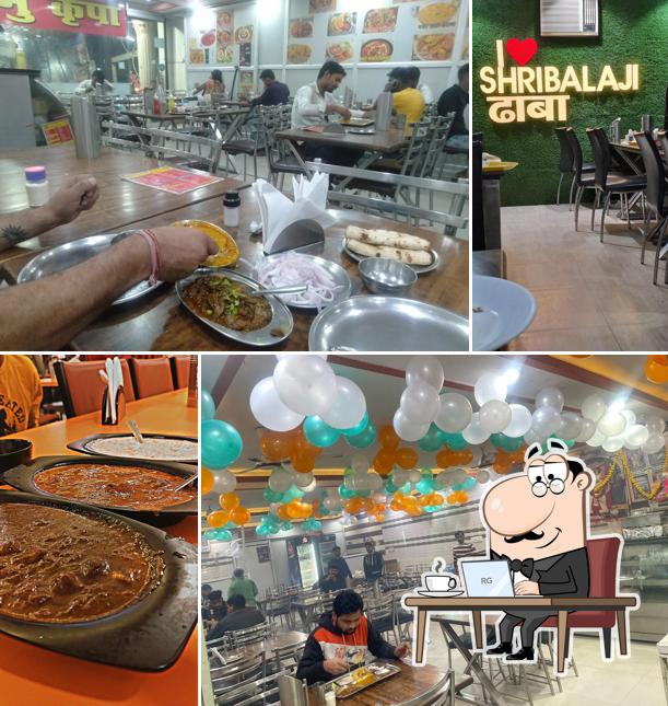 Take a seat at one of the tables at Shri Bala Ji Dhaba