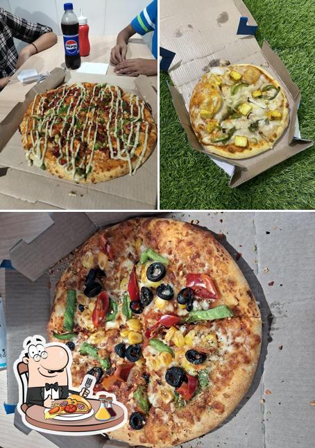 Pick pizza at Domino's Pizza Bhoop Narayan Singh Colony, Madhubani