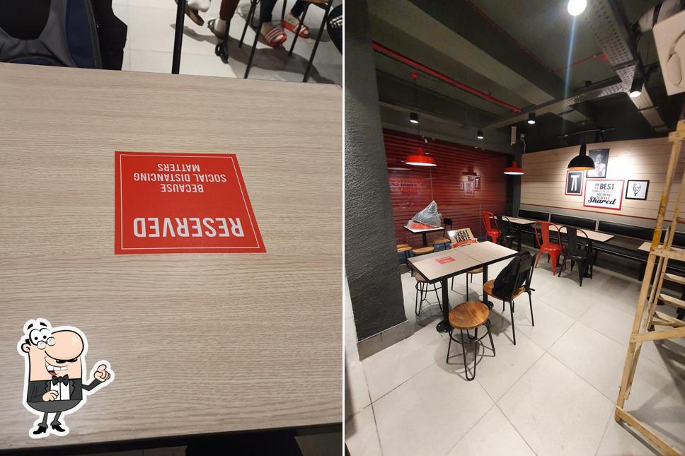 Take a seat at one of the tables at KFC