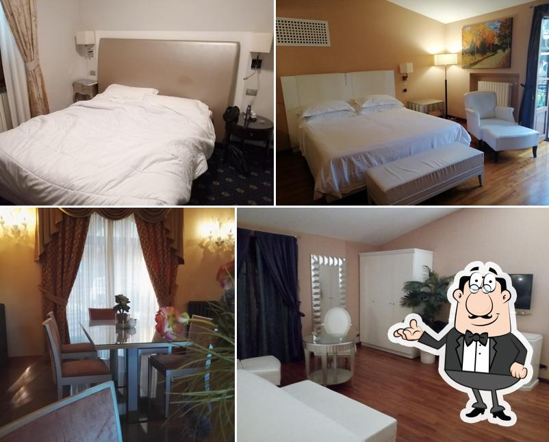 Siediti a un tavolo di Hotel Sangallo