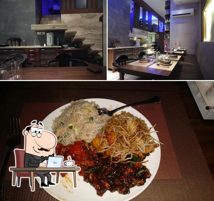 The picture of interior and food at Bhoomi - Family Restaurant & Bar