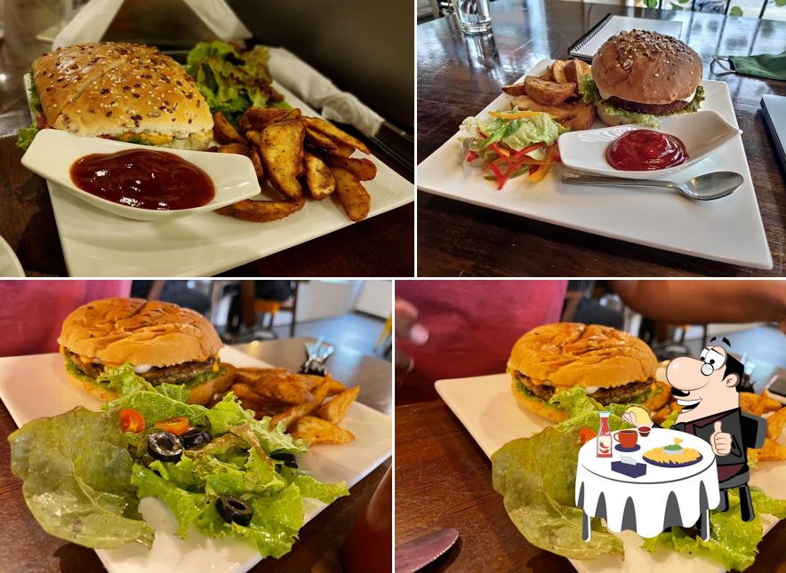 Taste one of the burgers offered by Cafe Hustle