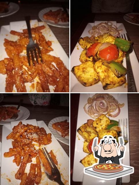 Pick pizza at Filmy Cafe & Bar by DeeZ