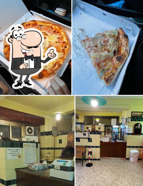 Questa è la immagine che raffigura la interni e cibo di Mister Pizza